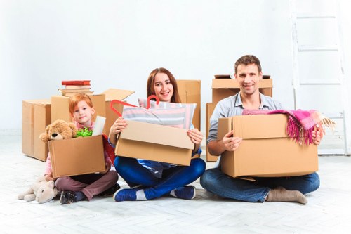 Professional moving team handling furniture in East Dulwich