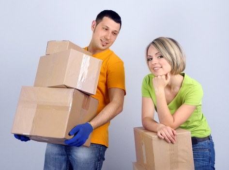 Professional movers carrying furniture in East Dulwich